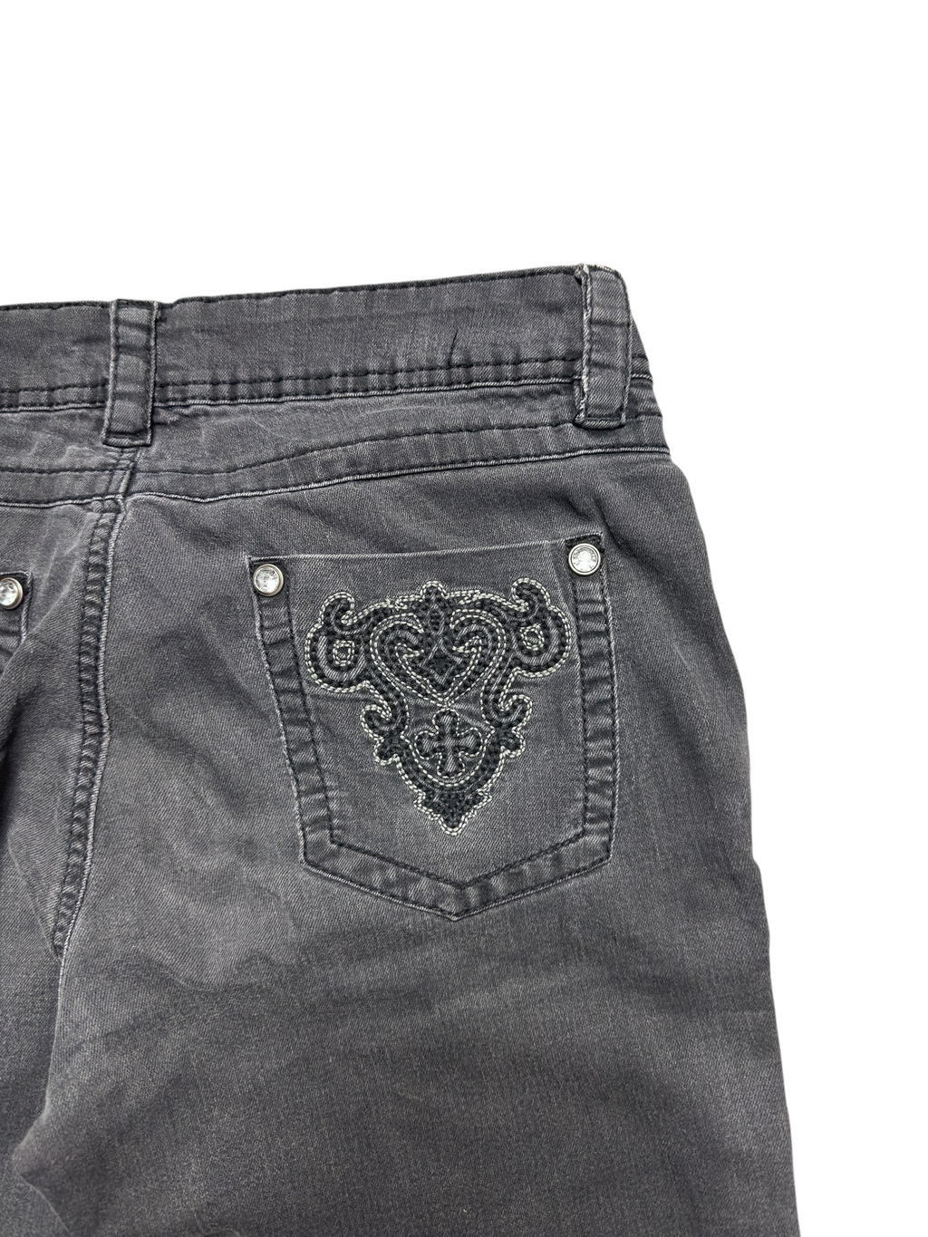 NinetyThree charcoal grey denim jeans featuring intricate back pocket embroidery and silver stud embellishments.