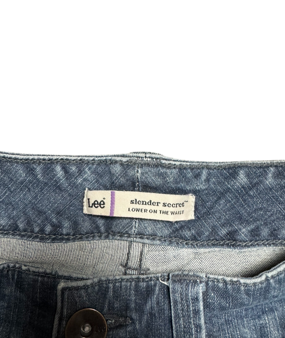 NinetyThree Lee Slender Secret denim jeans featuring a medium blue wash and a lower-on-the-waist fit label.